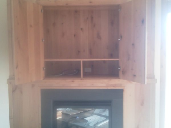 Stunning Fireplace Transformation - Image 2 by Cabe Construction, LLC